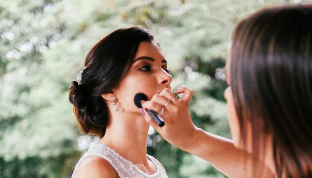 Makeup Artist Applying Wedding Makeup